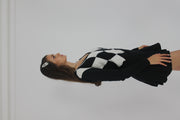 black and white argyle v-neck jumper detail 01