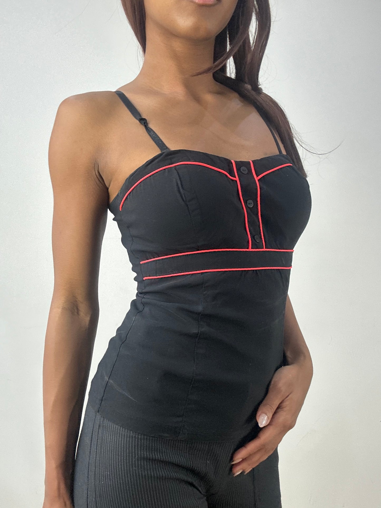BEST PICKS | small black corset style top with red piping details