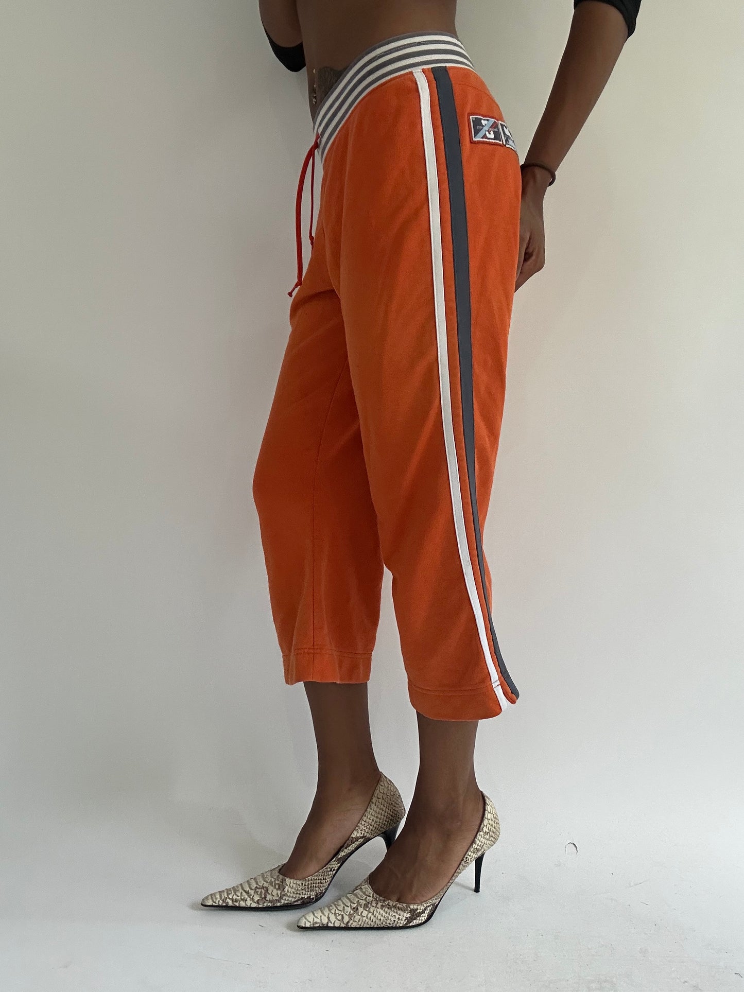 euro trash | small orange nike striped waist capri trousers
