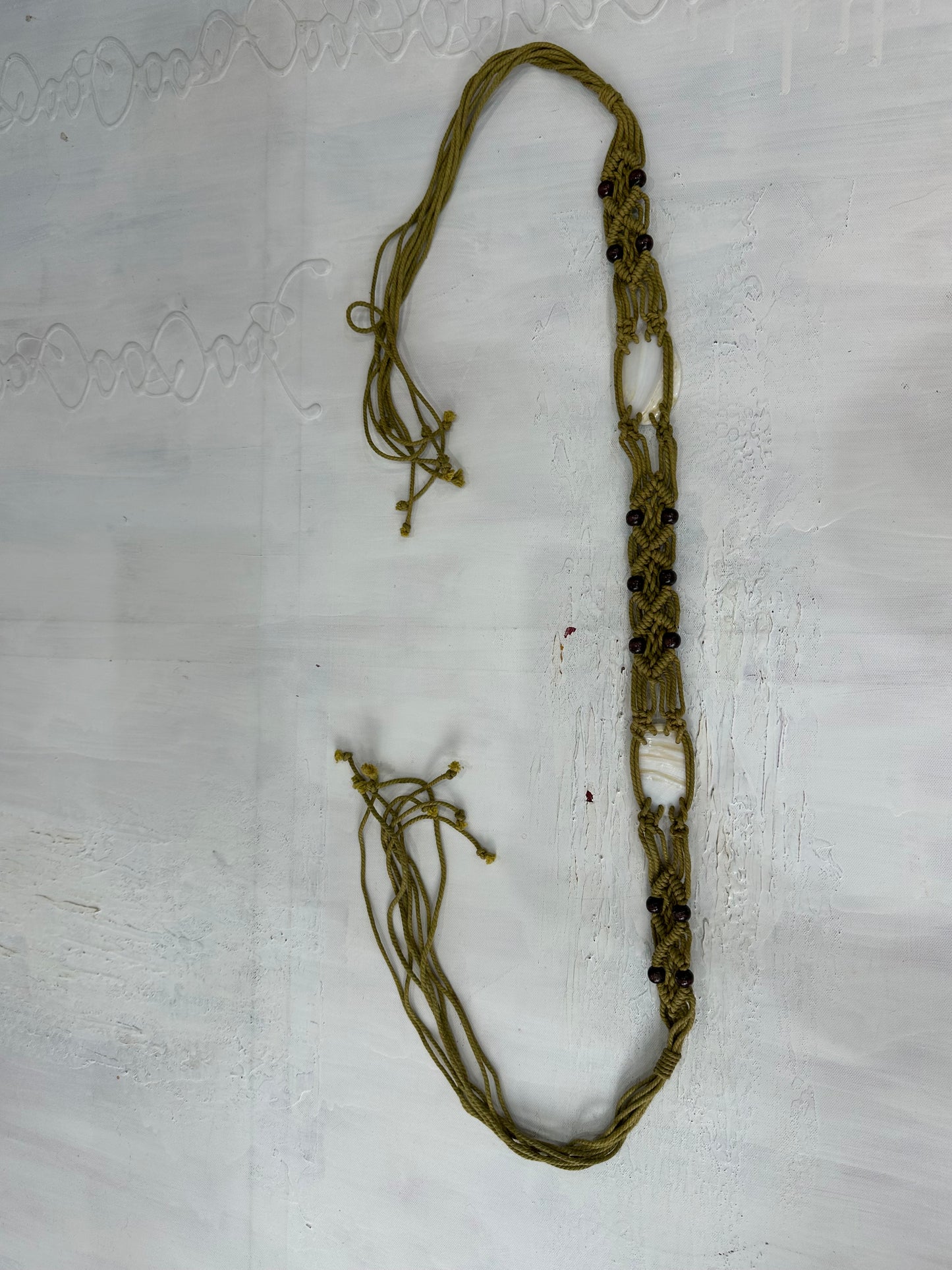 vintage edit: halloween | green and brown braided tie up belt with shell detail