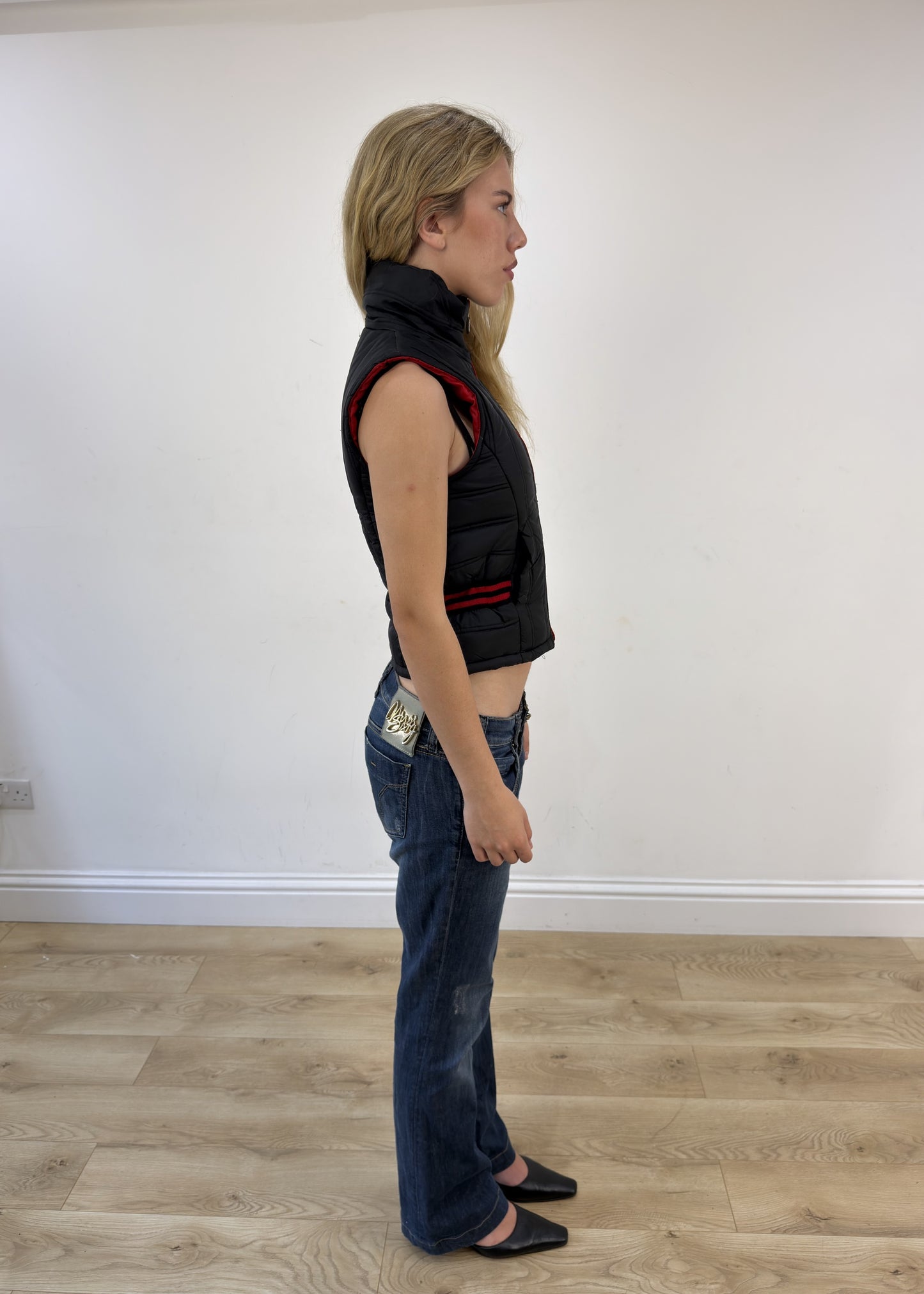 small black and red puffer gilet