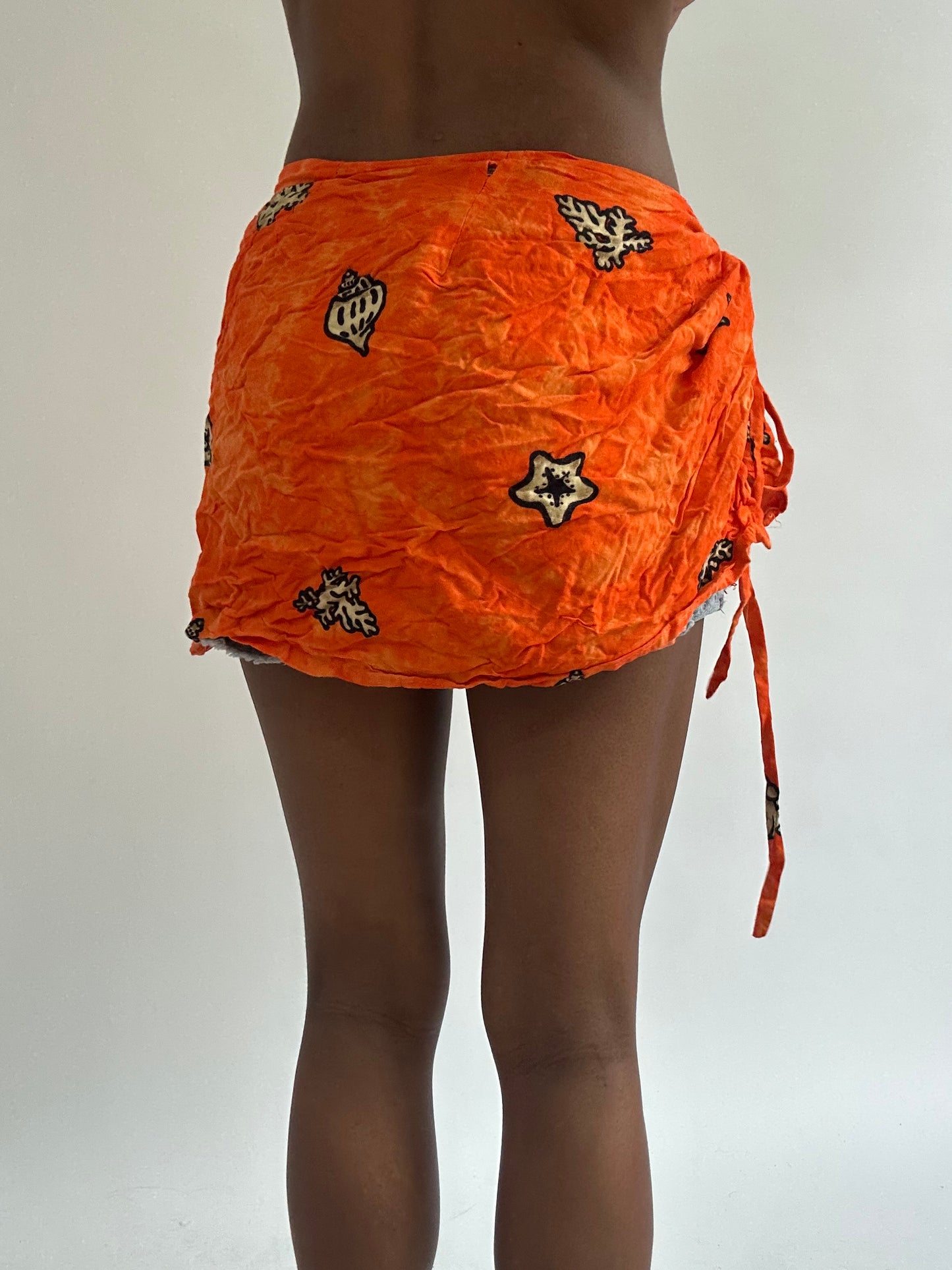 BEST PICKS | small orange patterned beach wrap skirt