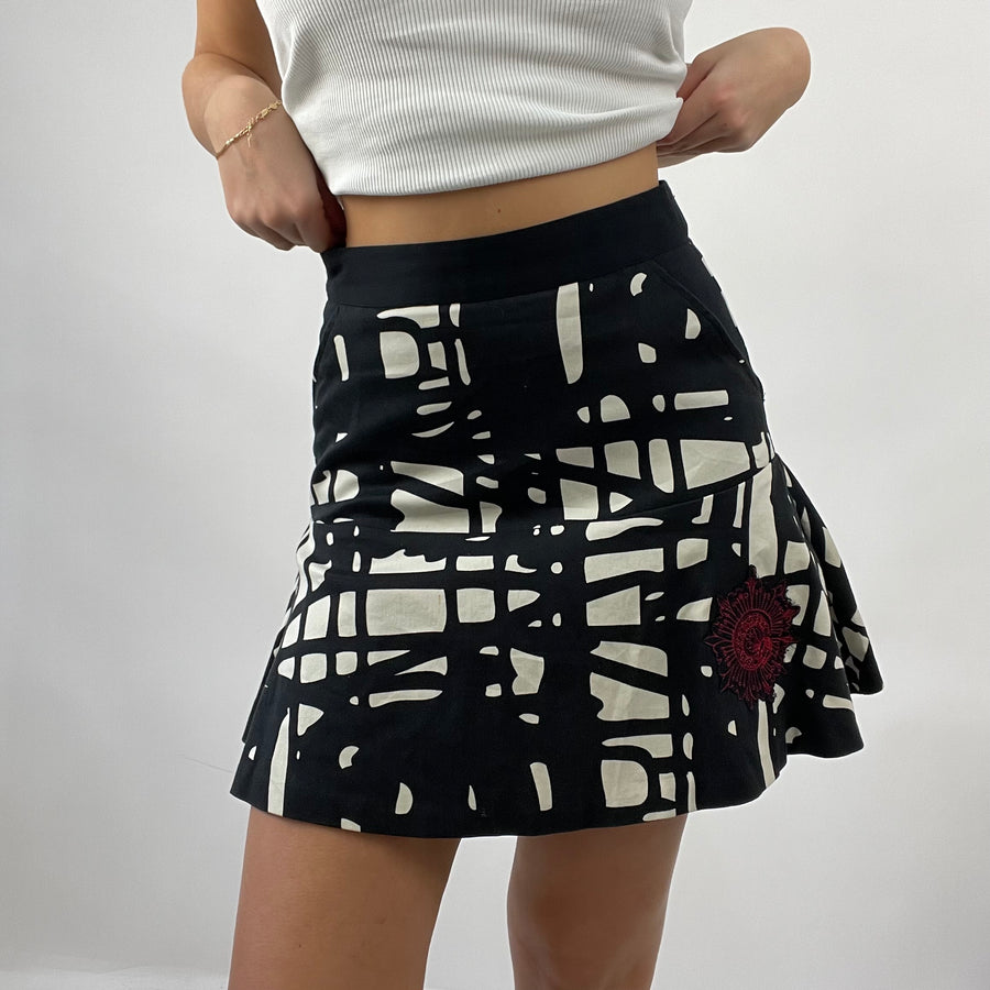 12 DAYS OF XMAS DROP | Pequeno e branco gráfico desigual disque