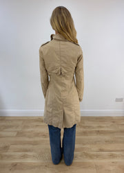 small beige trench coat