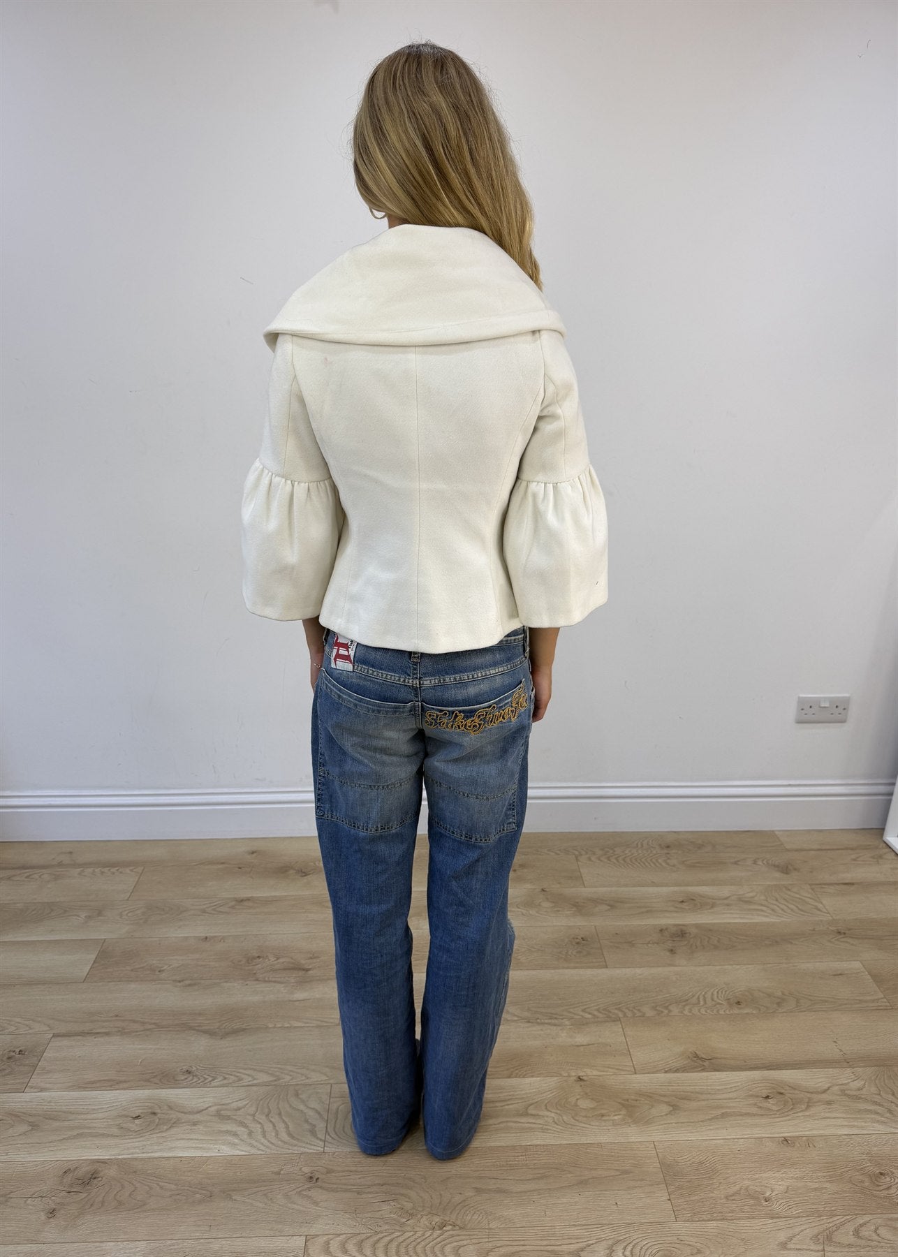 small white double-breasted flared-sleeve jacket