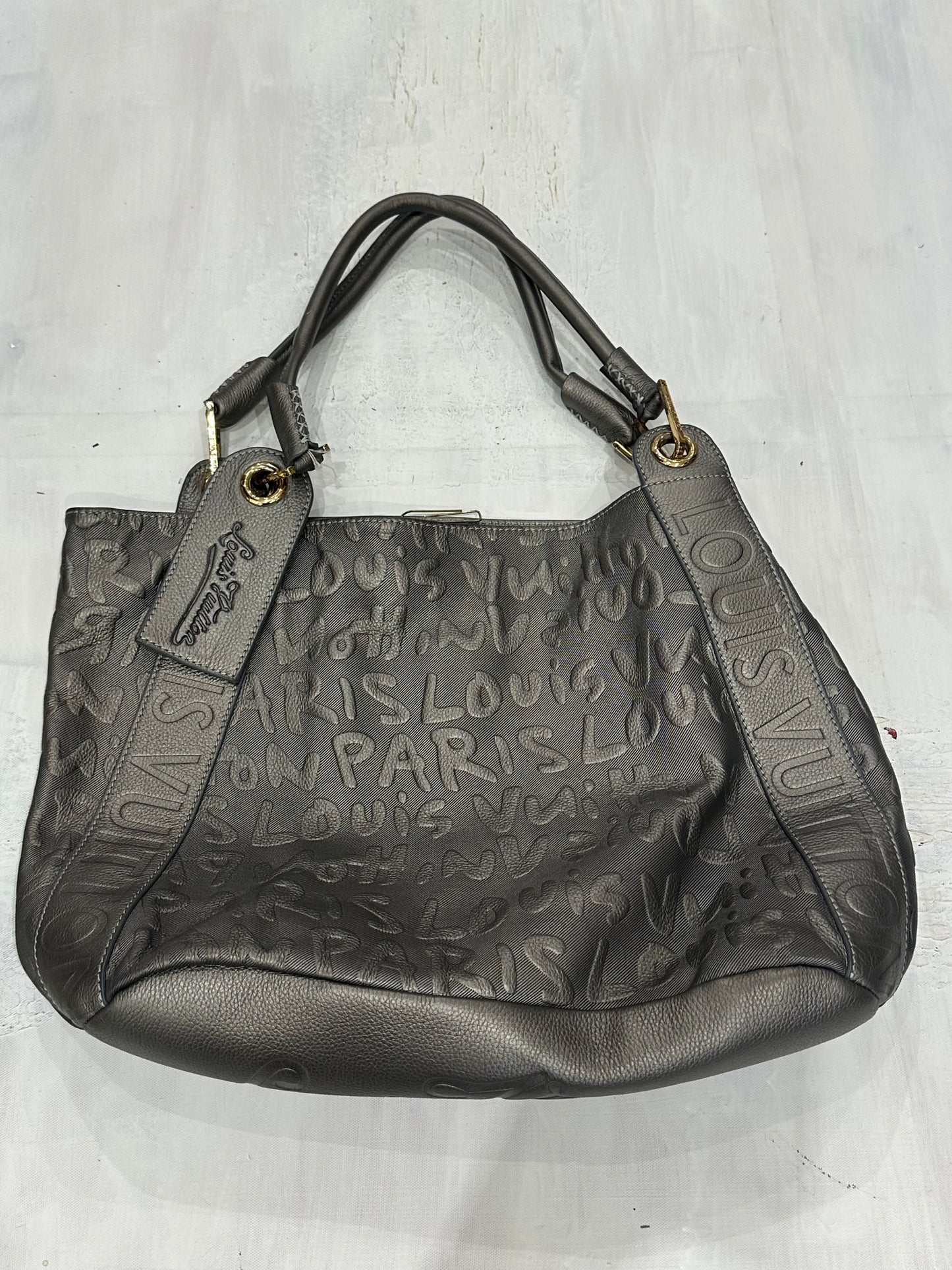 devil wears prada | silver louis vuitton monogram shoulder bag