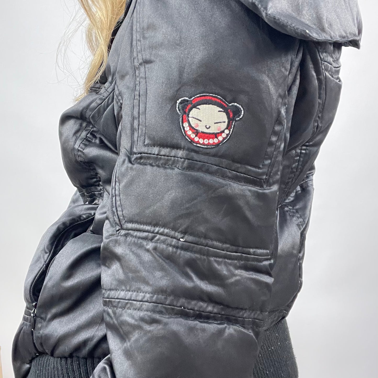 CHALET GIRL DROP | small black padded jacket with girl graphic