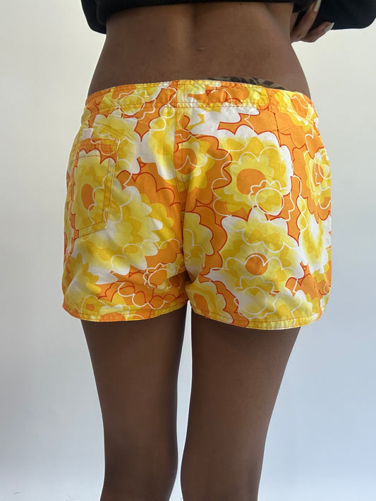 beach drop | small orange floral mini shorts