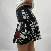 12 DAYS OF XMAS DROP | Pequeno e branco gráfico desigual disque