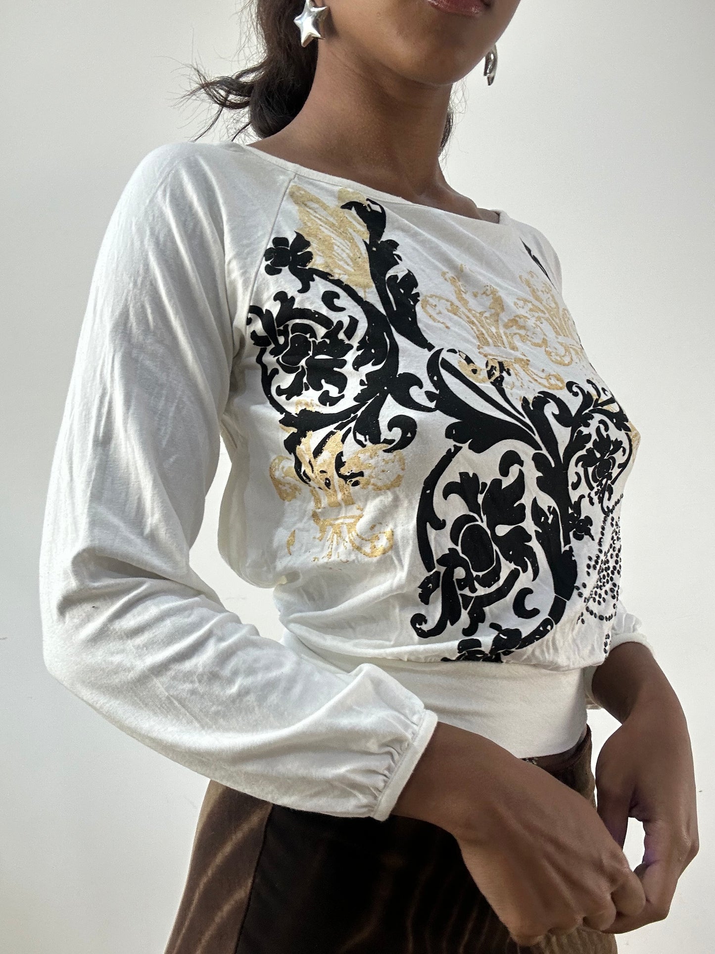 BEST PICKS | medium white long sleeve top with graphic print