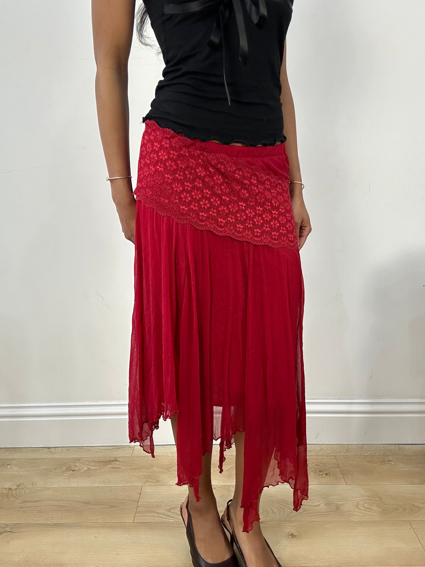BEST PICKS | small red asymmetrical flowy skirt with floral embroidery