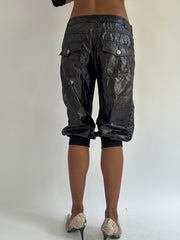 euro trash | small black leather style cropped cargo trousers