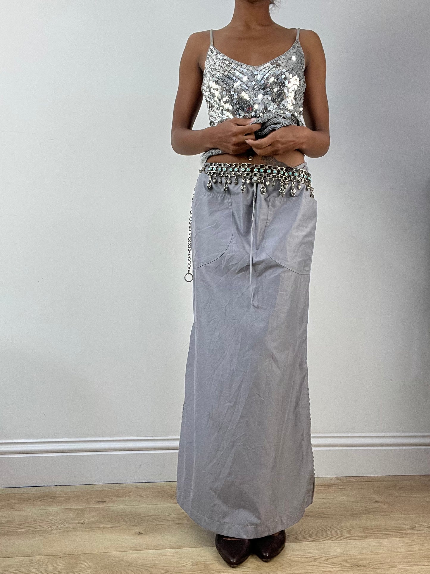 BEST PICKS | silver and blue chain belt with drop metal hardware details