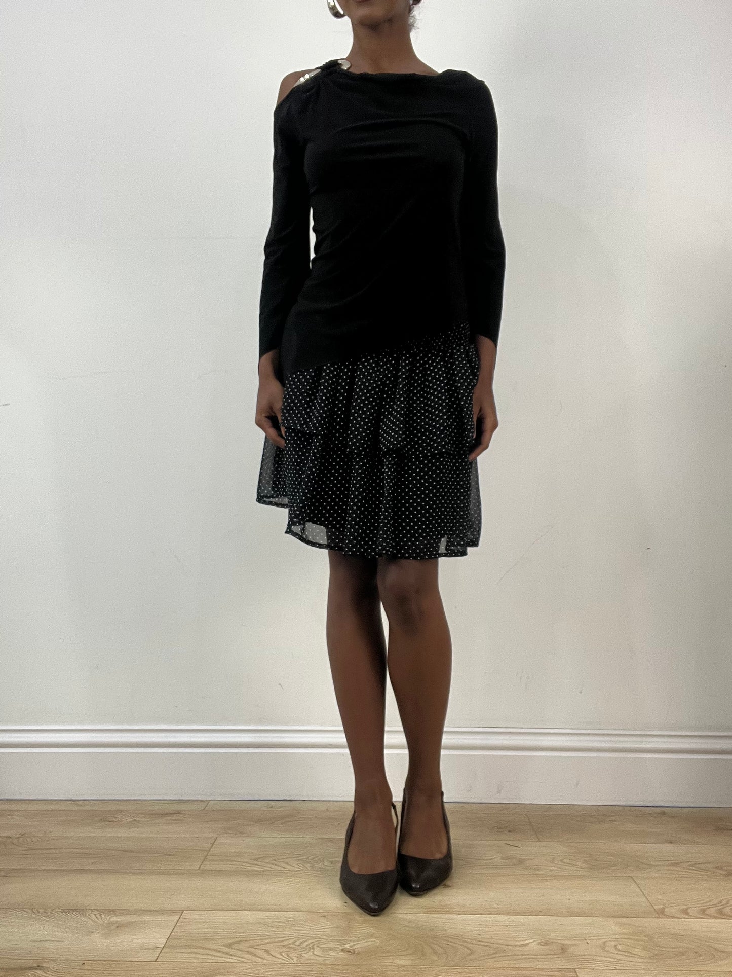 LFW edit | small black long sleeve top with metal pendant detail