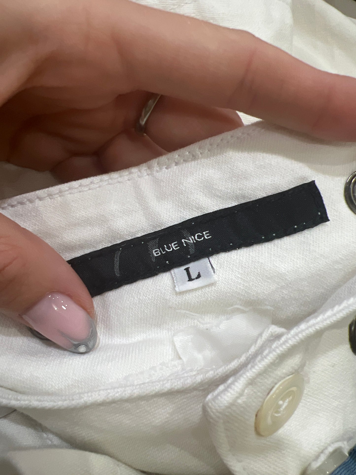 BEST PICKS | small white flared trousers with eyelet detail