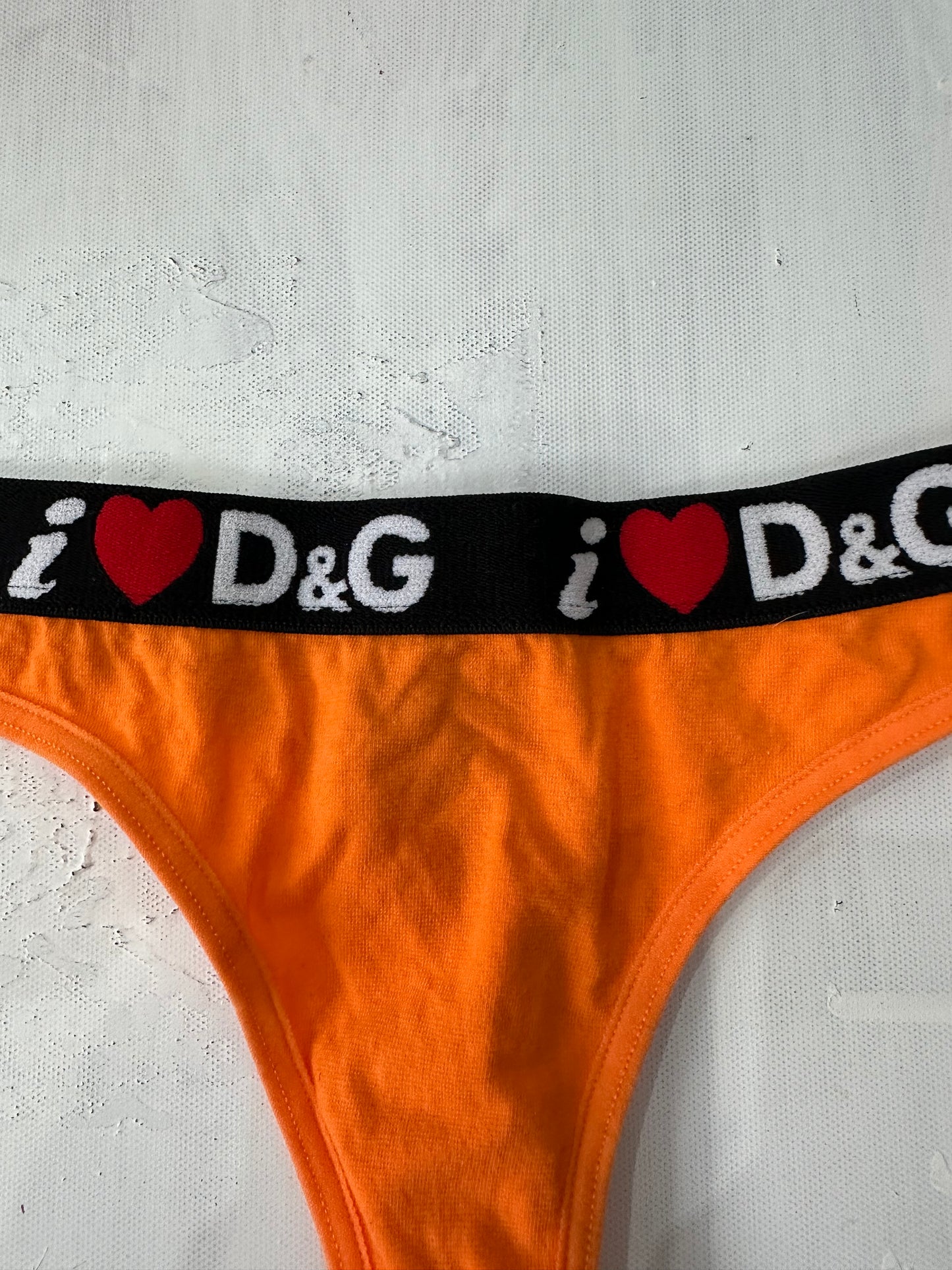 vintage edit: valentine’s day | extra small orange dolce and gabbana thong