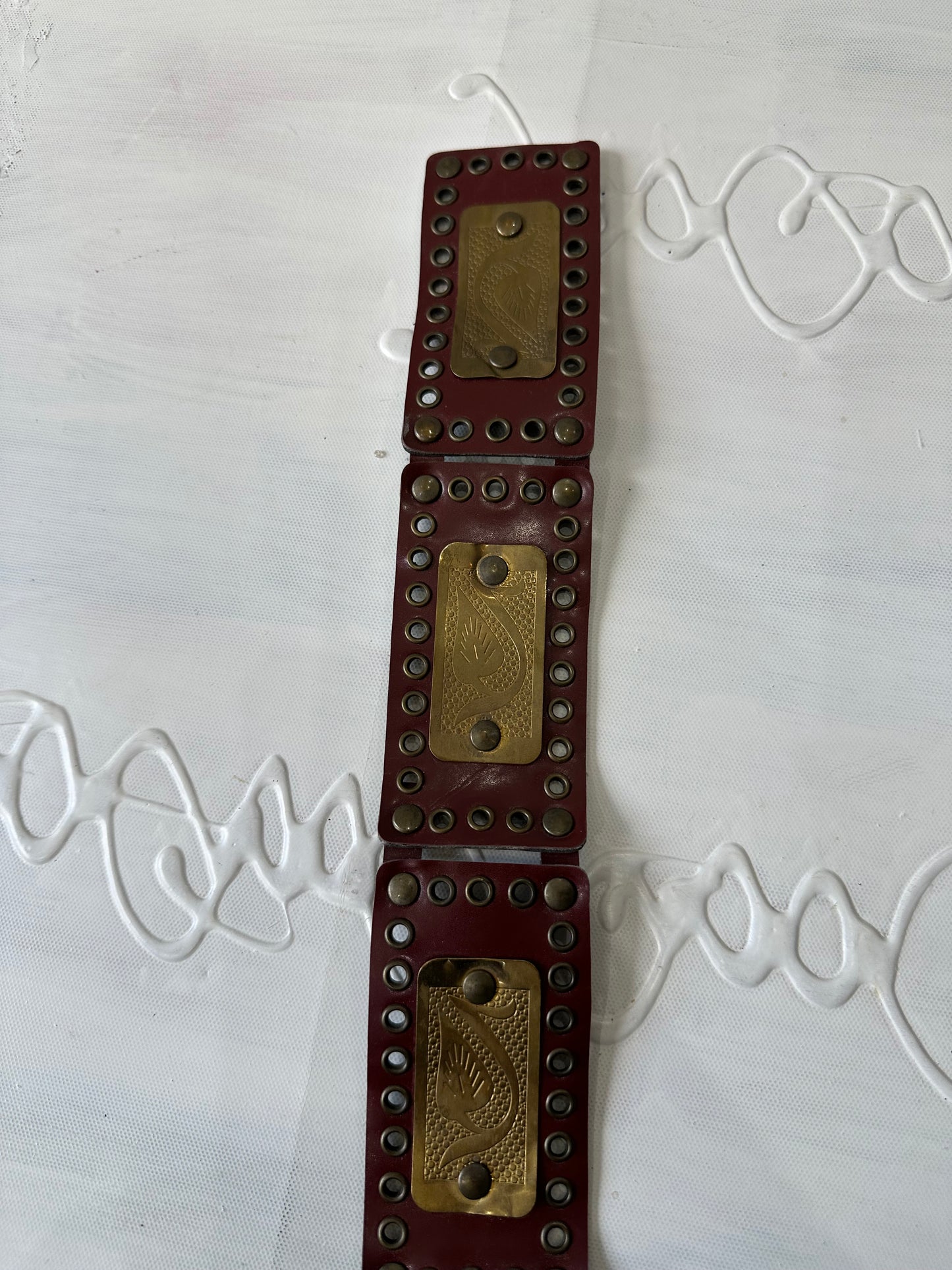 BEST PICKS | one size burgundy statement belt with gold hardware