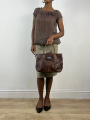 vintage edit: indie sleaze | brown faux leather shoulder bag with croc pattern