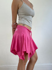 💻‼️small pink billabong asymmetric skirt with white spell out on the bum