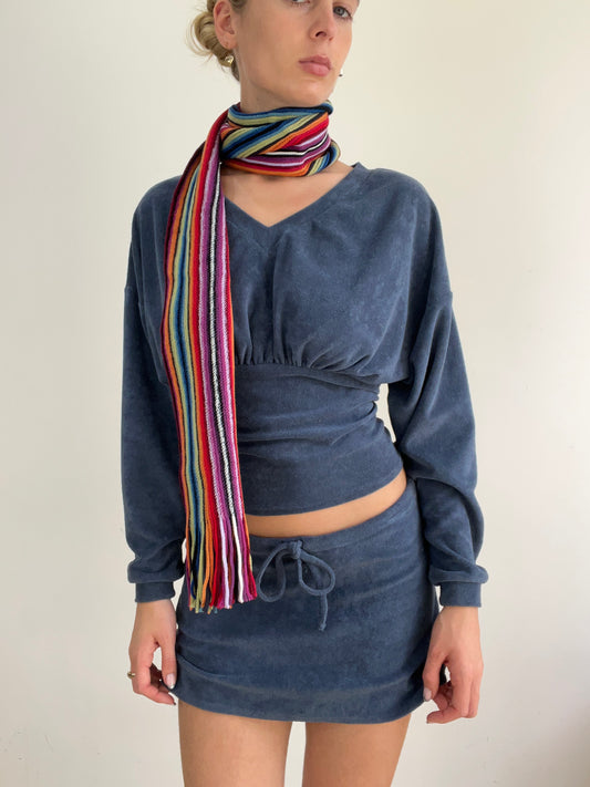 material: punto · prenda: bufanda · detalles: arcoíris + 💻 + ‼️