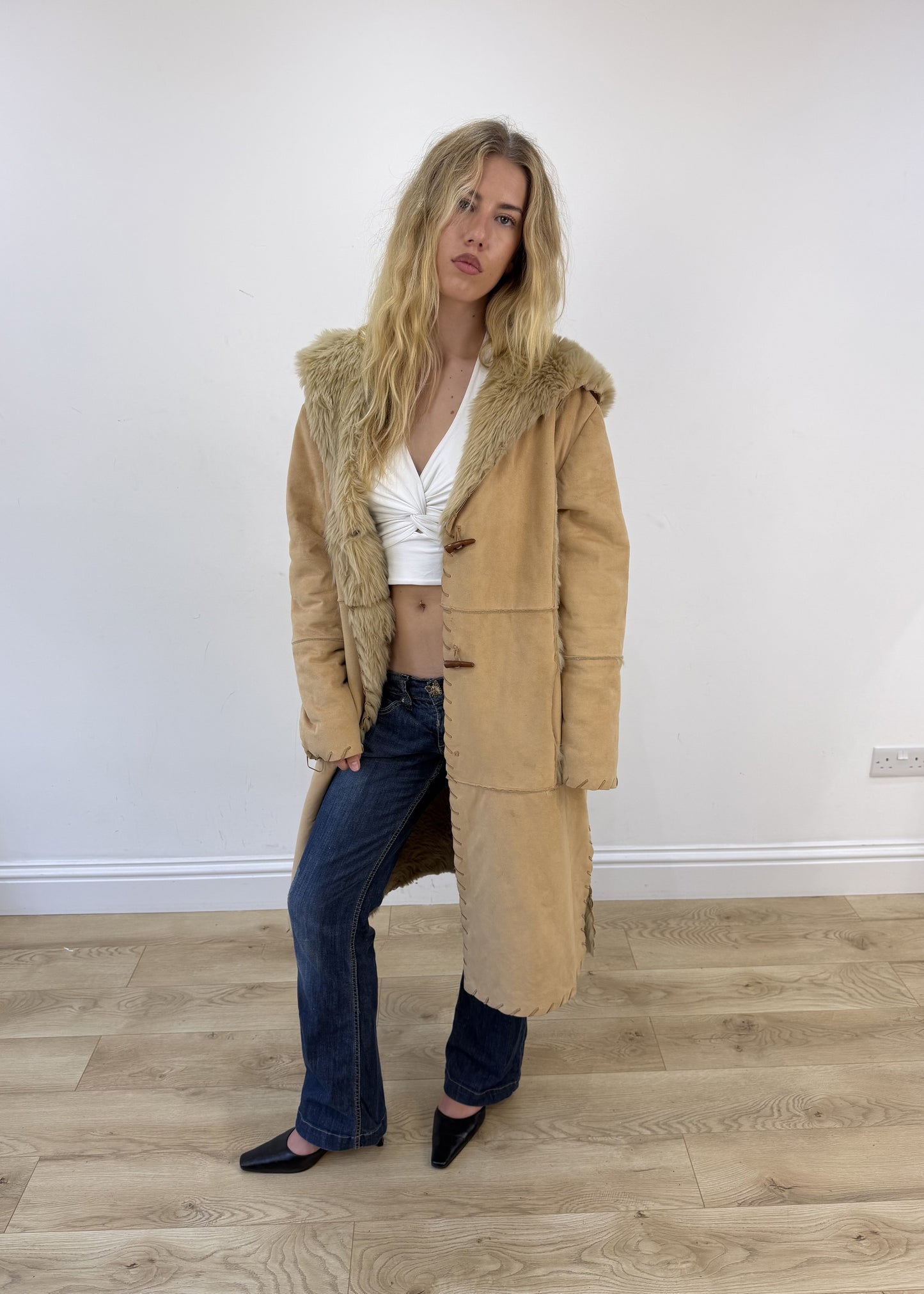 small tan afghan coat