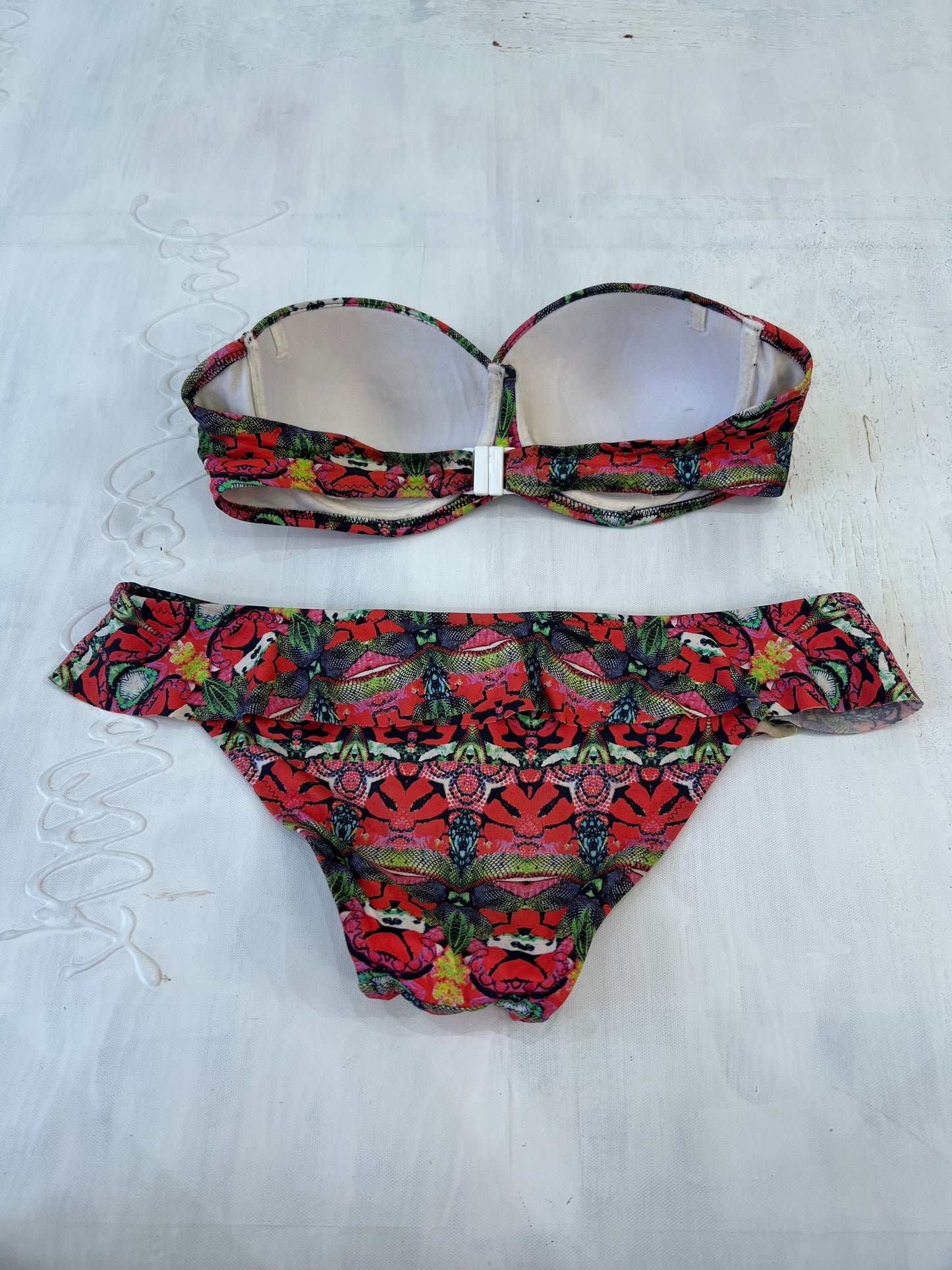 summer edit | medium red and green bandeau style bikini set with abstract print all over