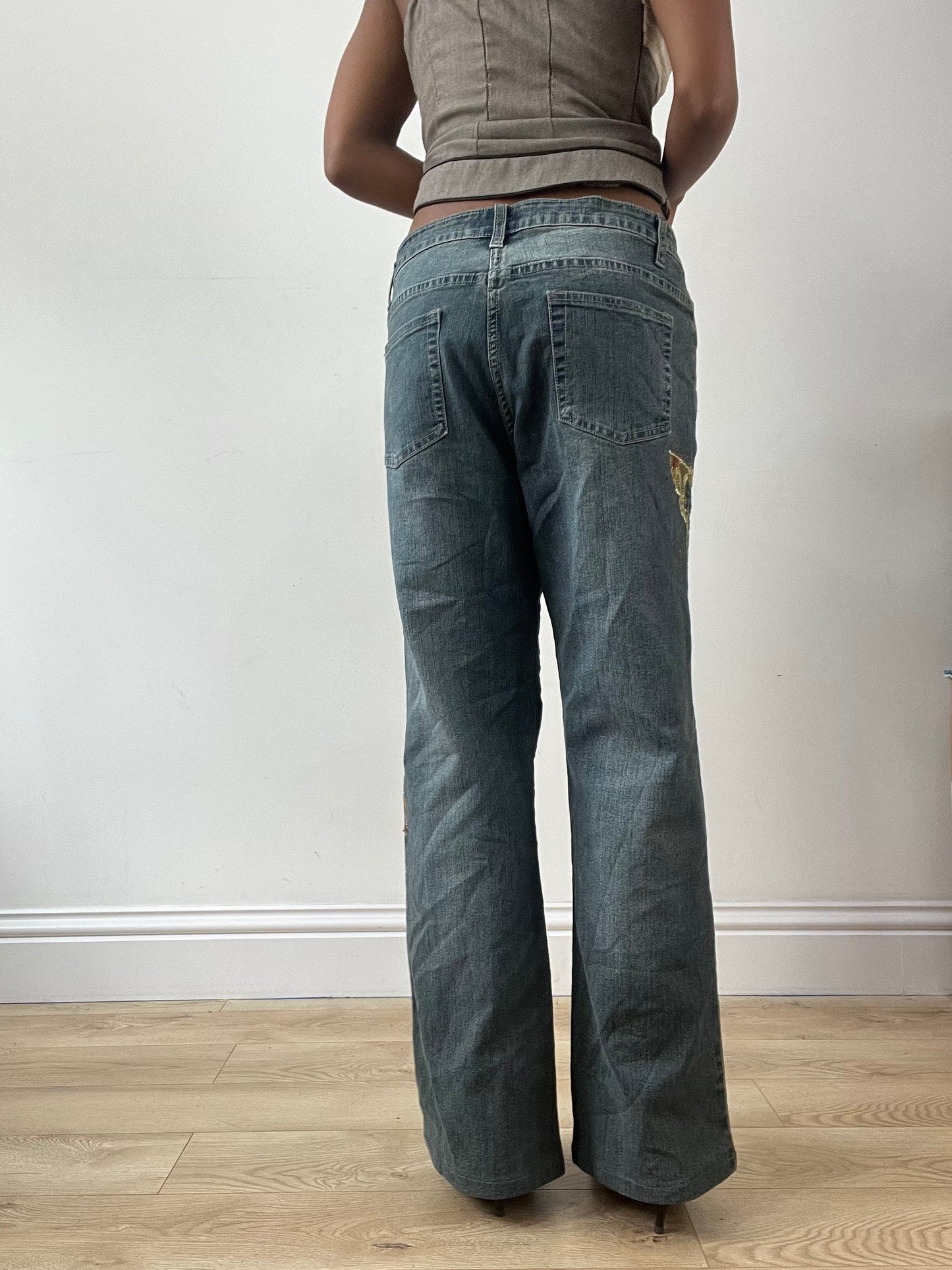 LFW edit | medium blue denim jeans with gold butterfly embroidery and rhinestones