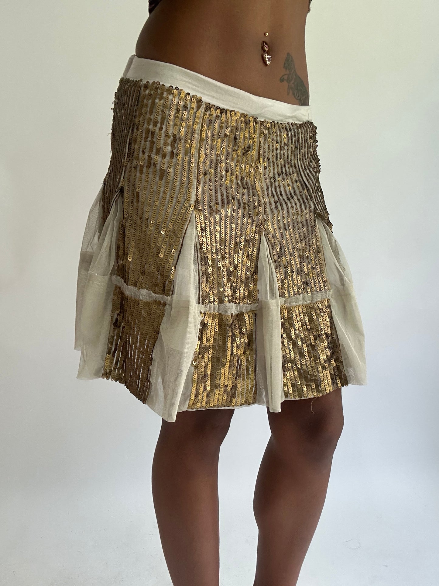 olivia rodrigo drop | small cream sisley sequin midi skirt