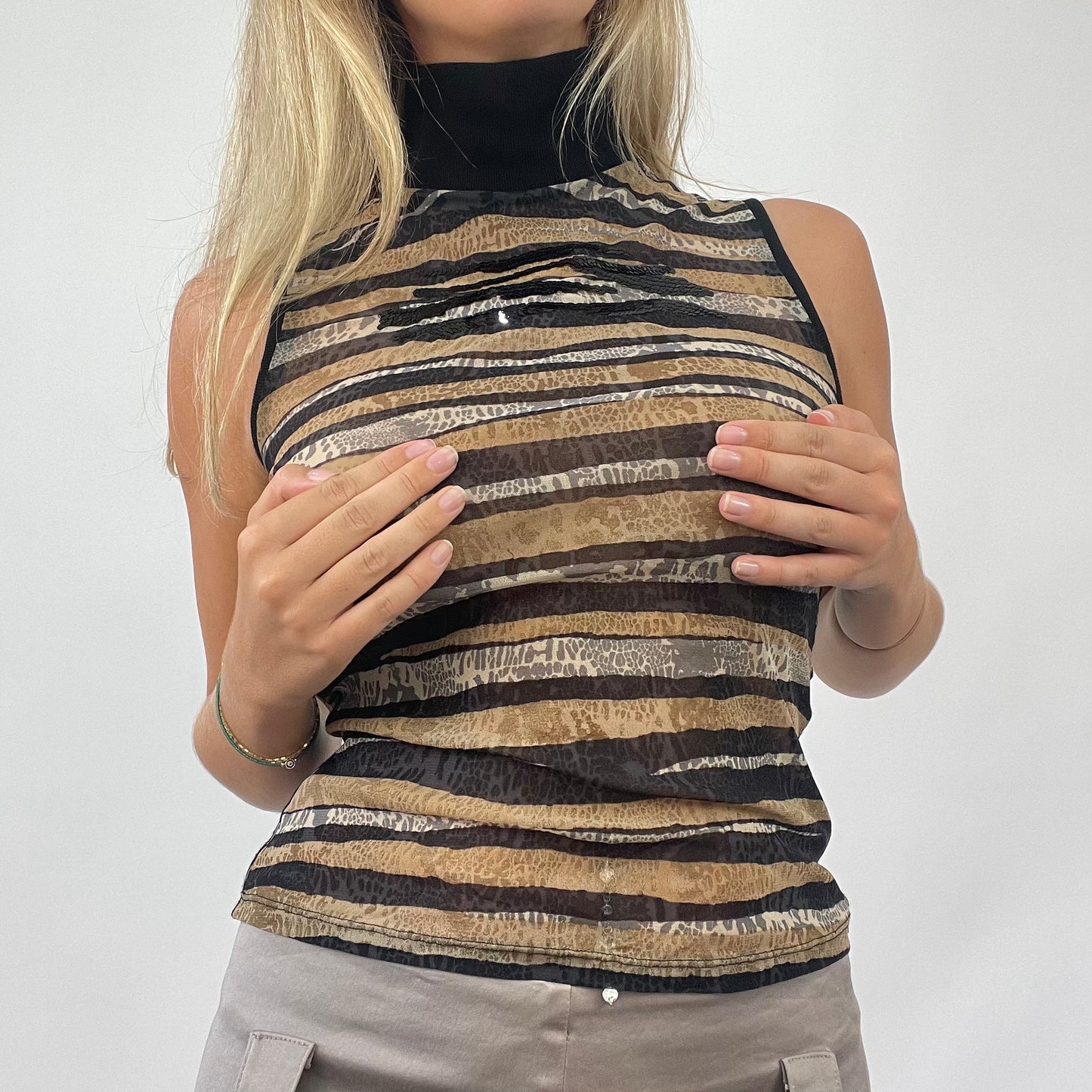 OLIVIA RODRIGO DROP | small black patterned sleeveless mesh turtleneck top