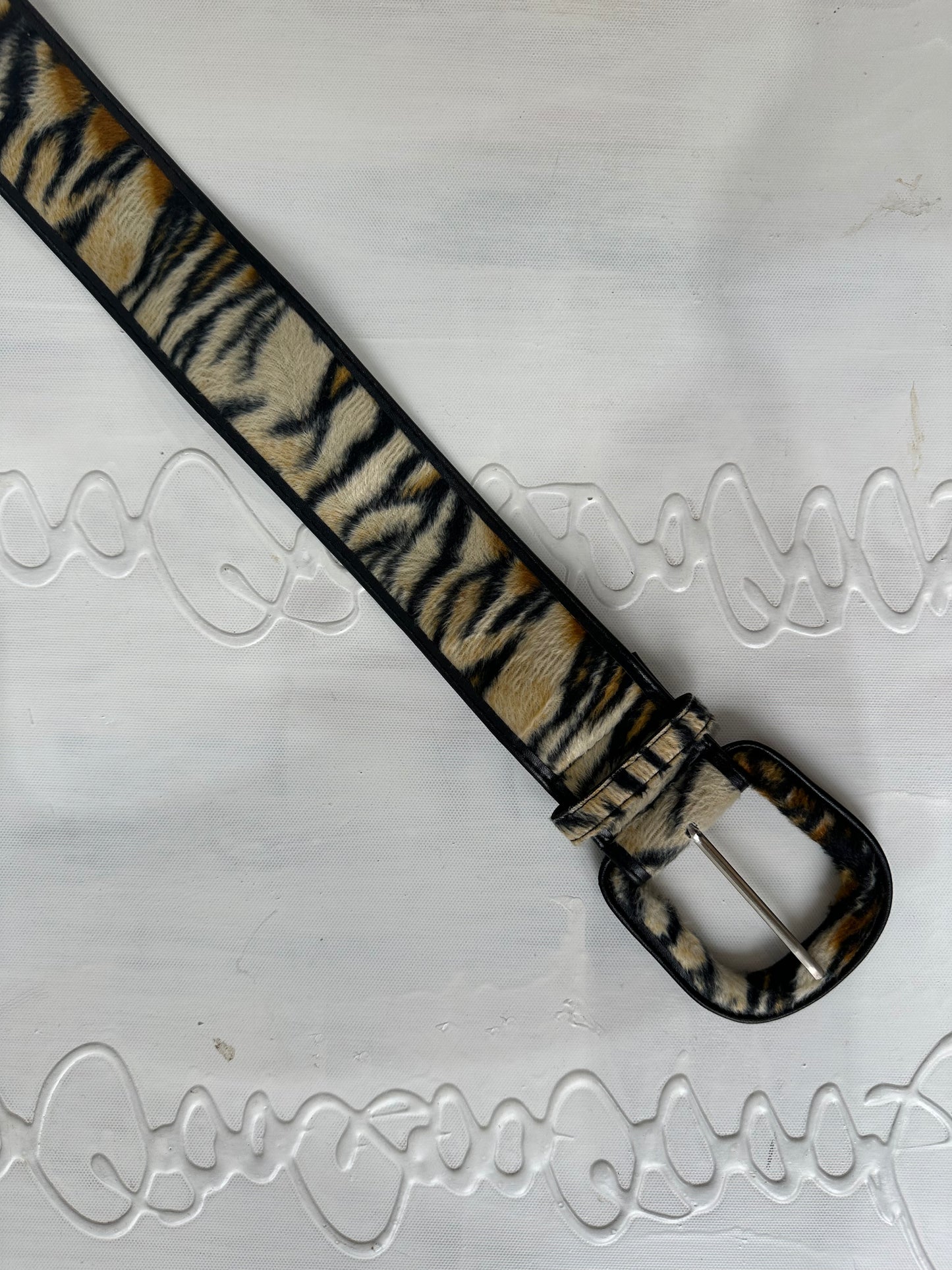 BEST PICKS | black and brown faux fur belt with tiger print