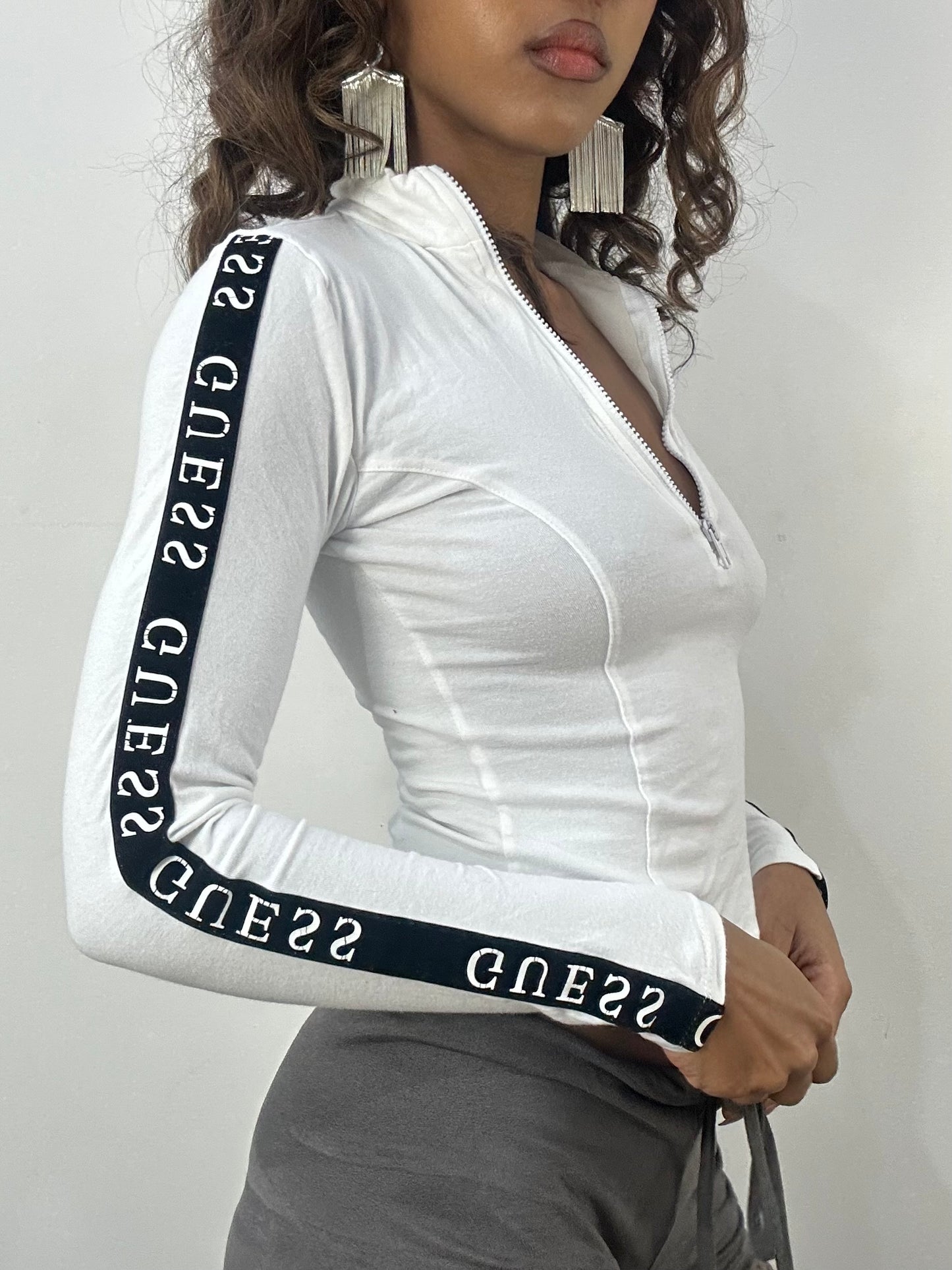 athleisure edit | small white guess zip up long sleeve top