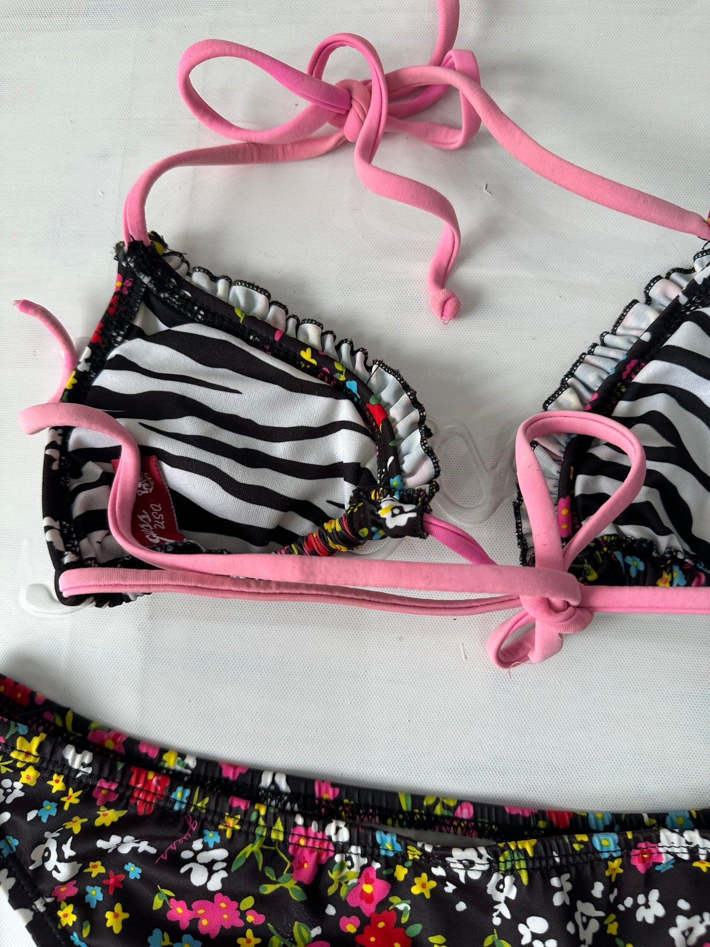 vintage edit thirty-one | small black floral bikini set with pink strap detail
