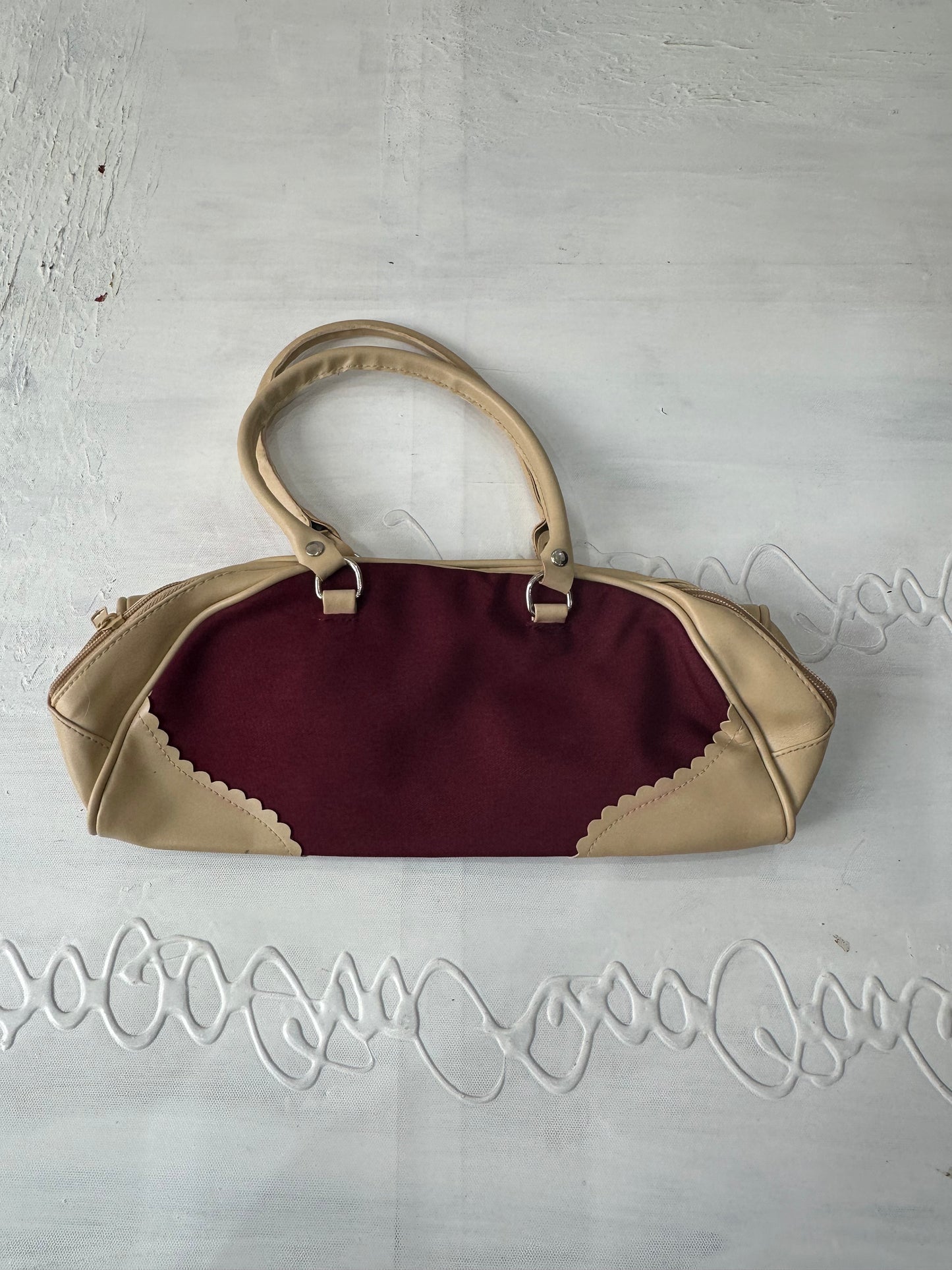 vintage edit thirty-two | burgundy and cream handbag with scalloped detail