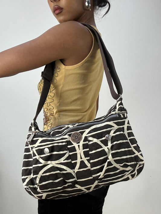 vintage edit: halloween | brown and white kipling shoulder bag with silver hardware