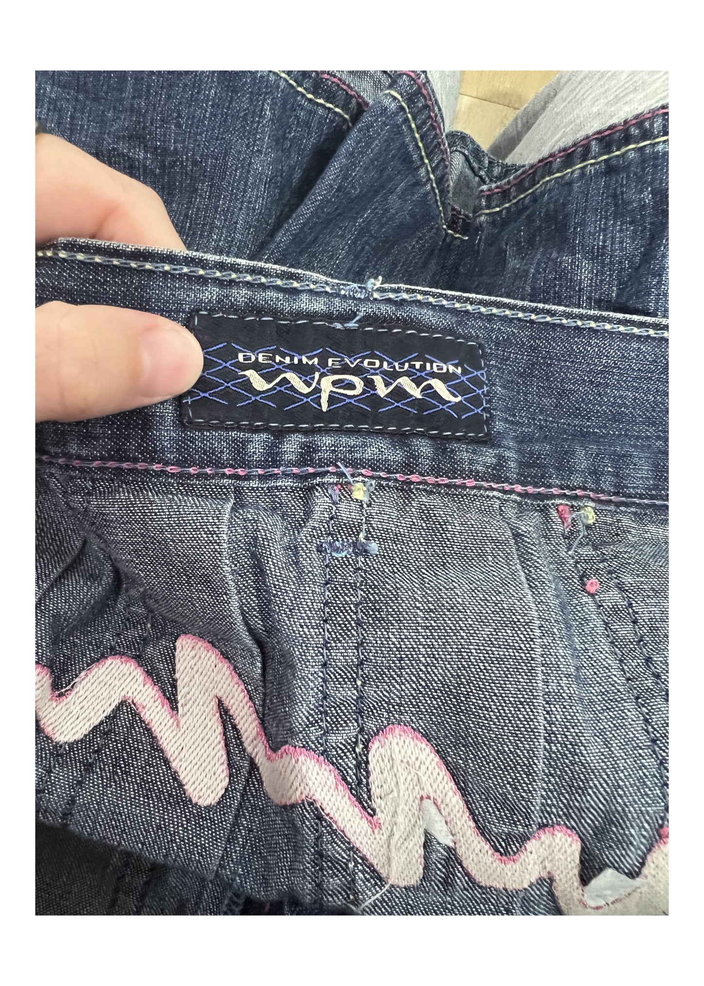 medium denim pleated mini skirt brand label