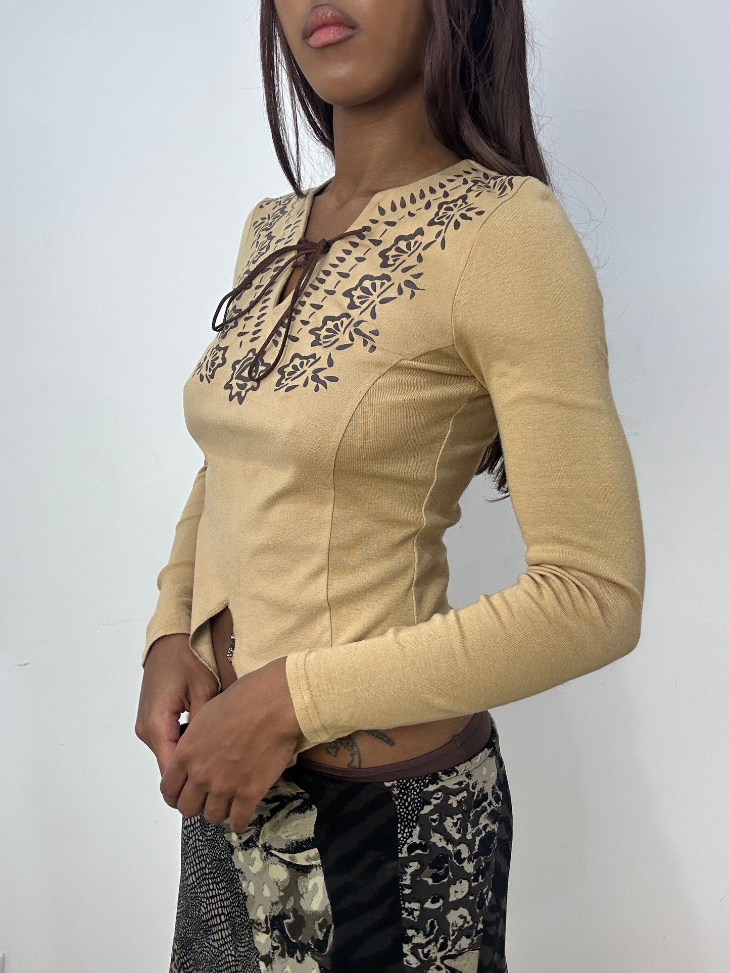 BEST PICKS | small tan long sleeve top with lace up front