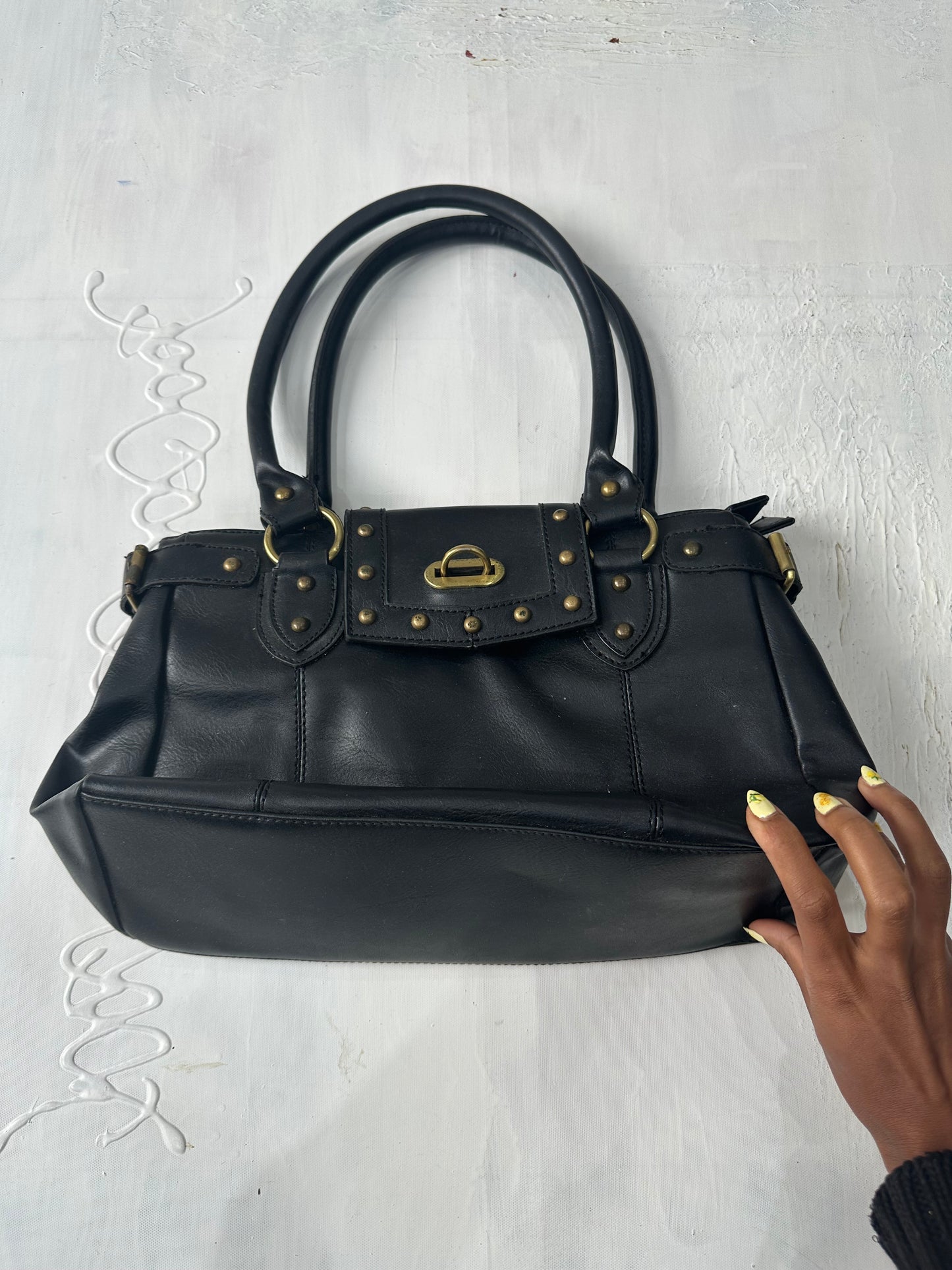 BEST PICKS | black shoulder bag with gold hardware details