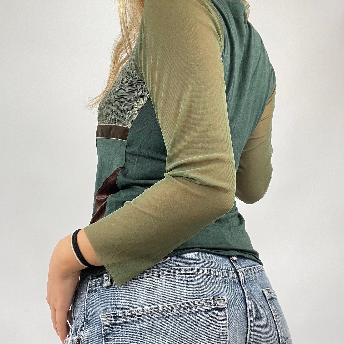 GRUNGE COQUETTE DROP | small green long sleeve top with mesh sleeves and lace detail