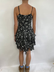 COACHELLA DROP | small black and white ruffle midi dress with floral pattern all over