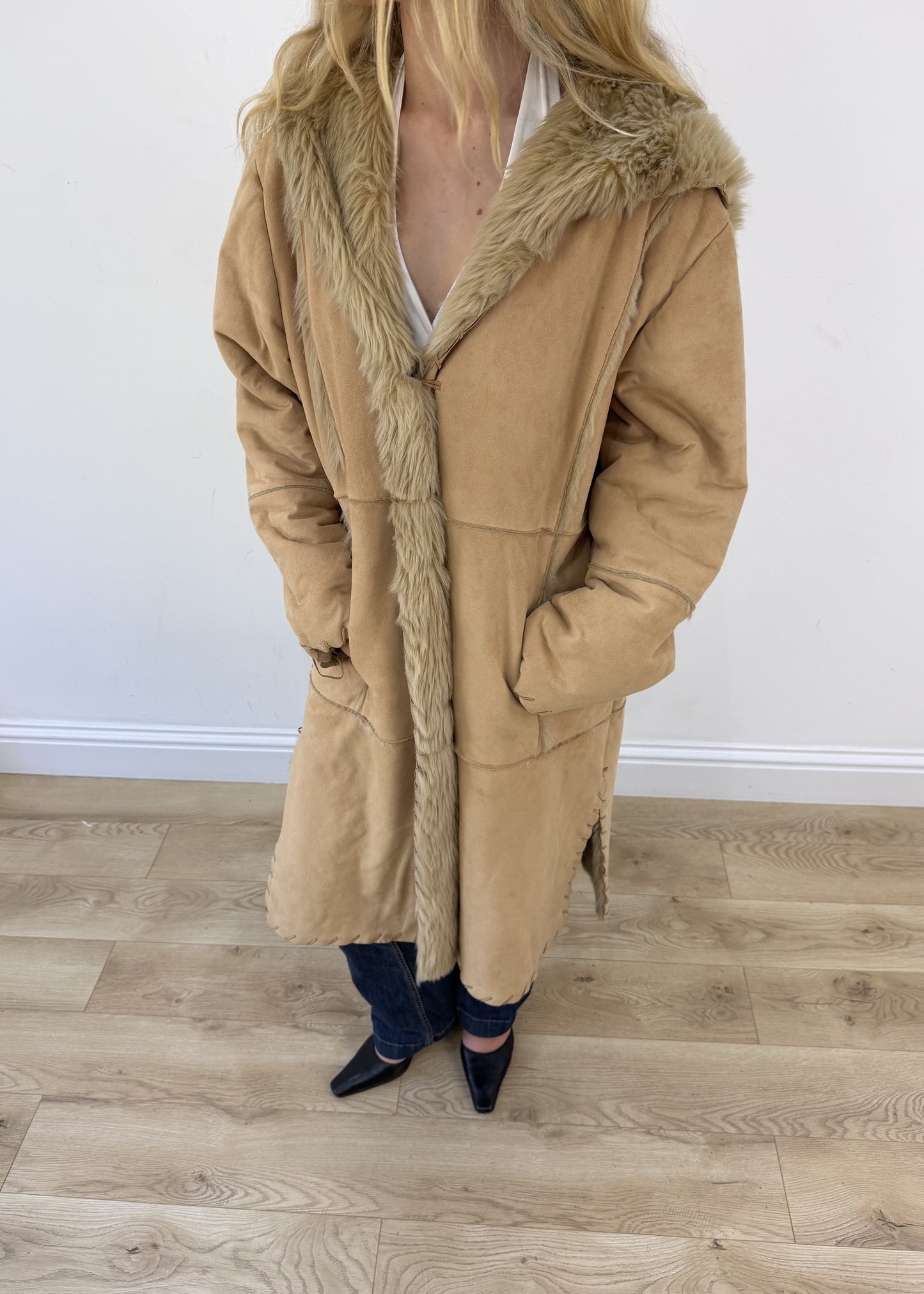small tan afghan coat