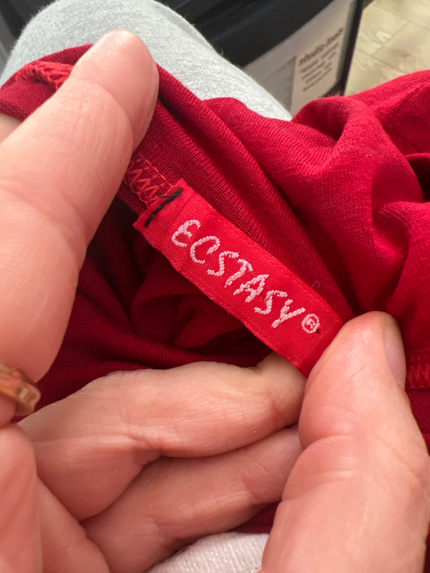 euro trash | small red zip detail roll neck top