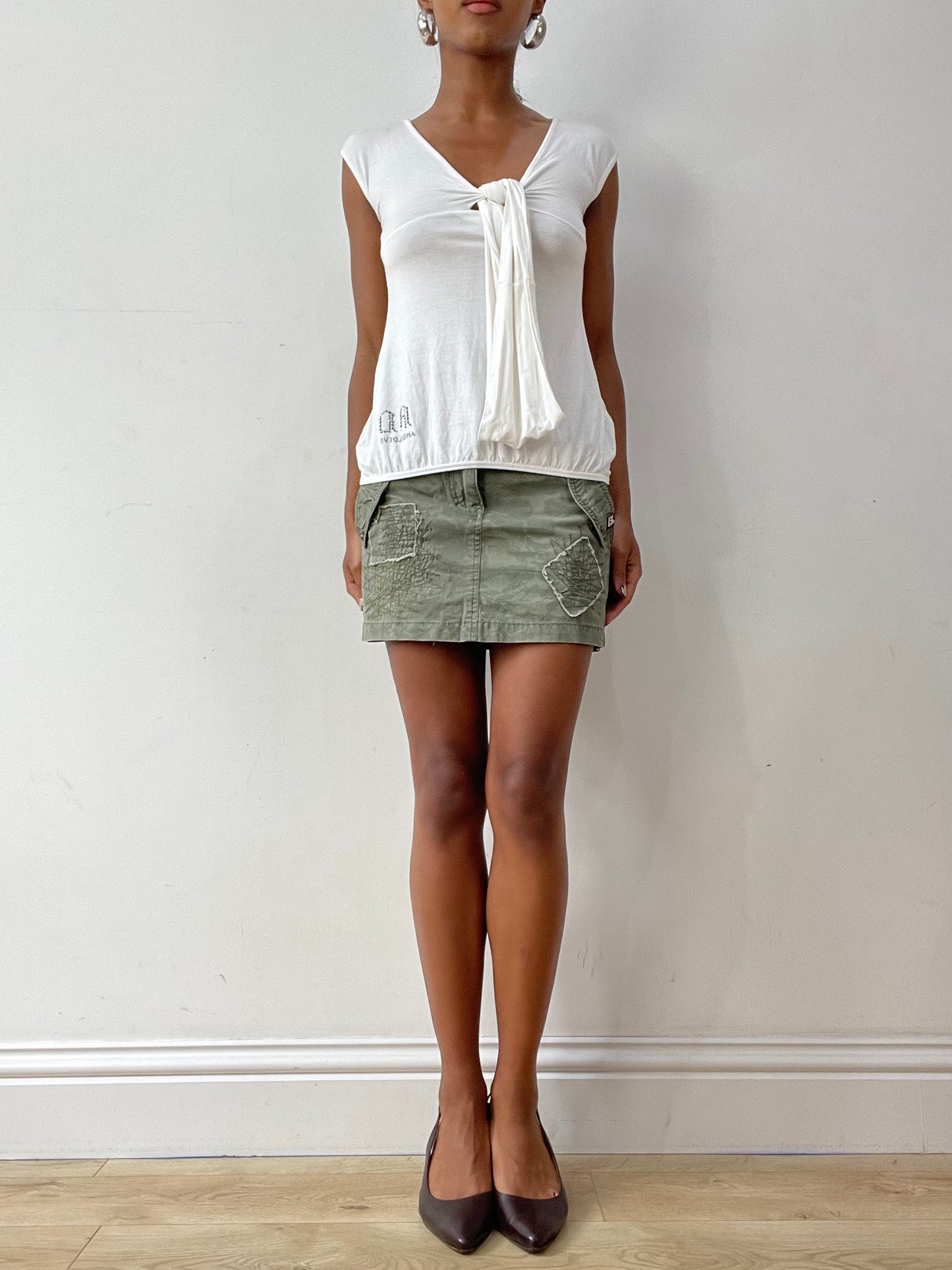 midsummer edit | small green cargo style mini skirt with studding detail