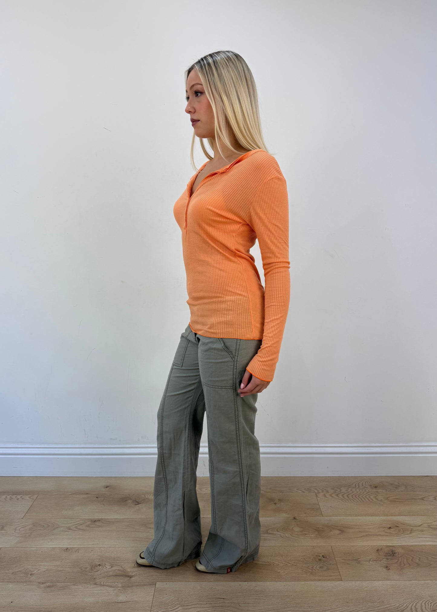 medium orange ribbed button long sleeve top