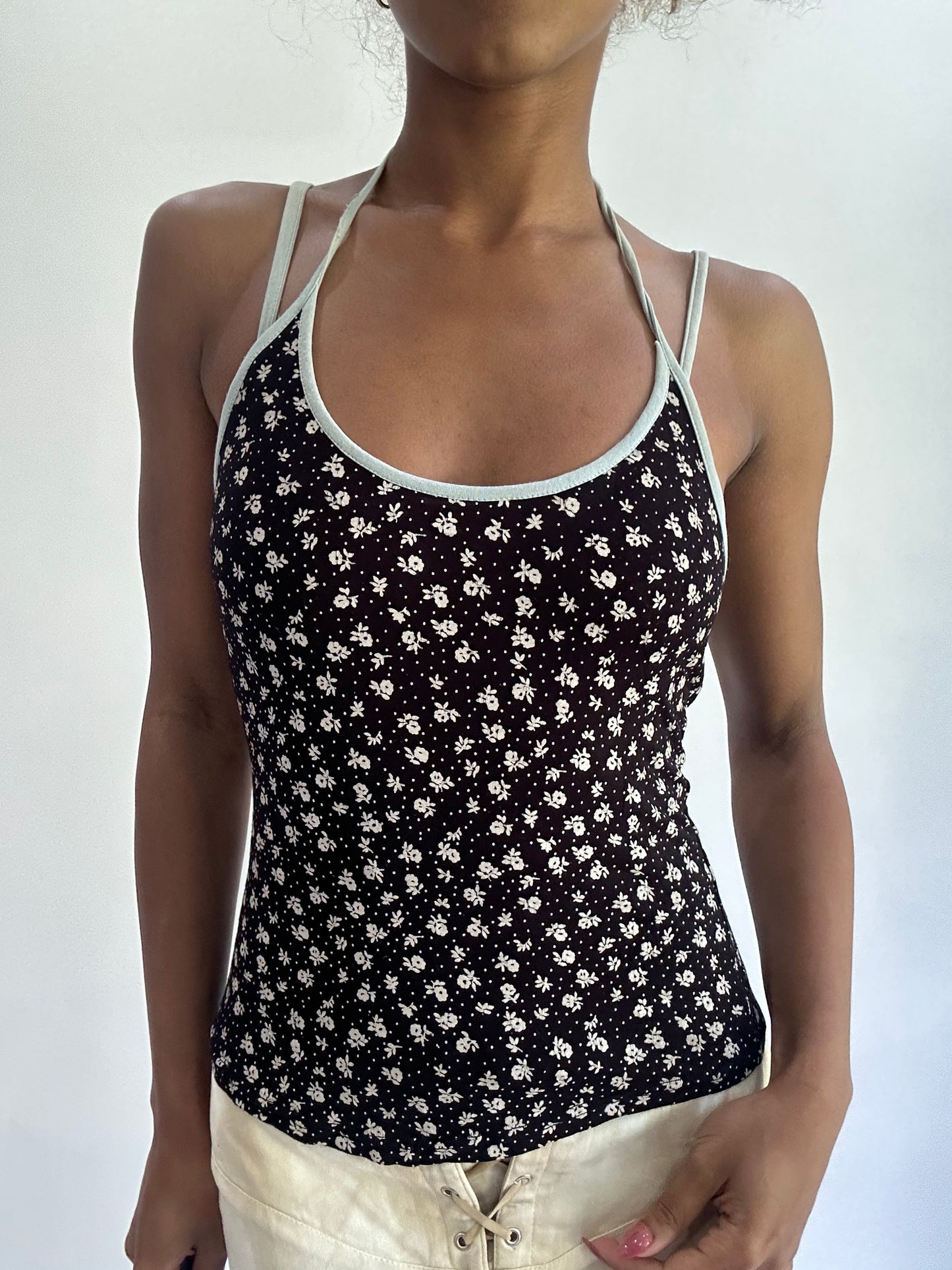olivia rodrigo drop | small black floral halterneck top