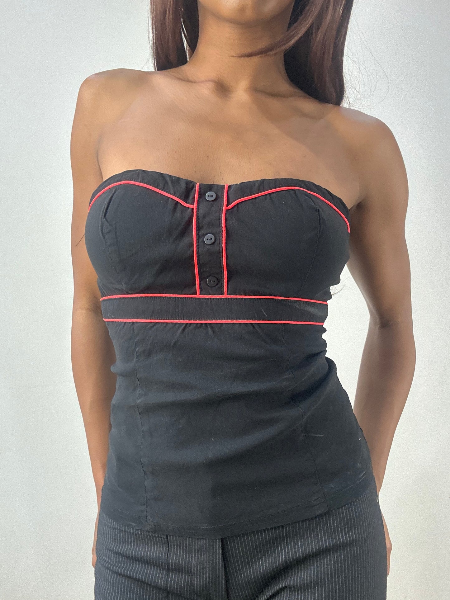 BEST PICKS | small black corset style top with red piping details