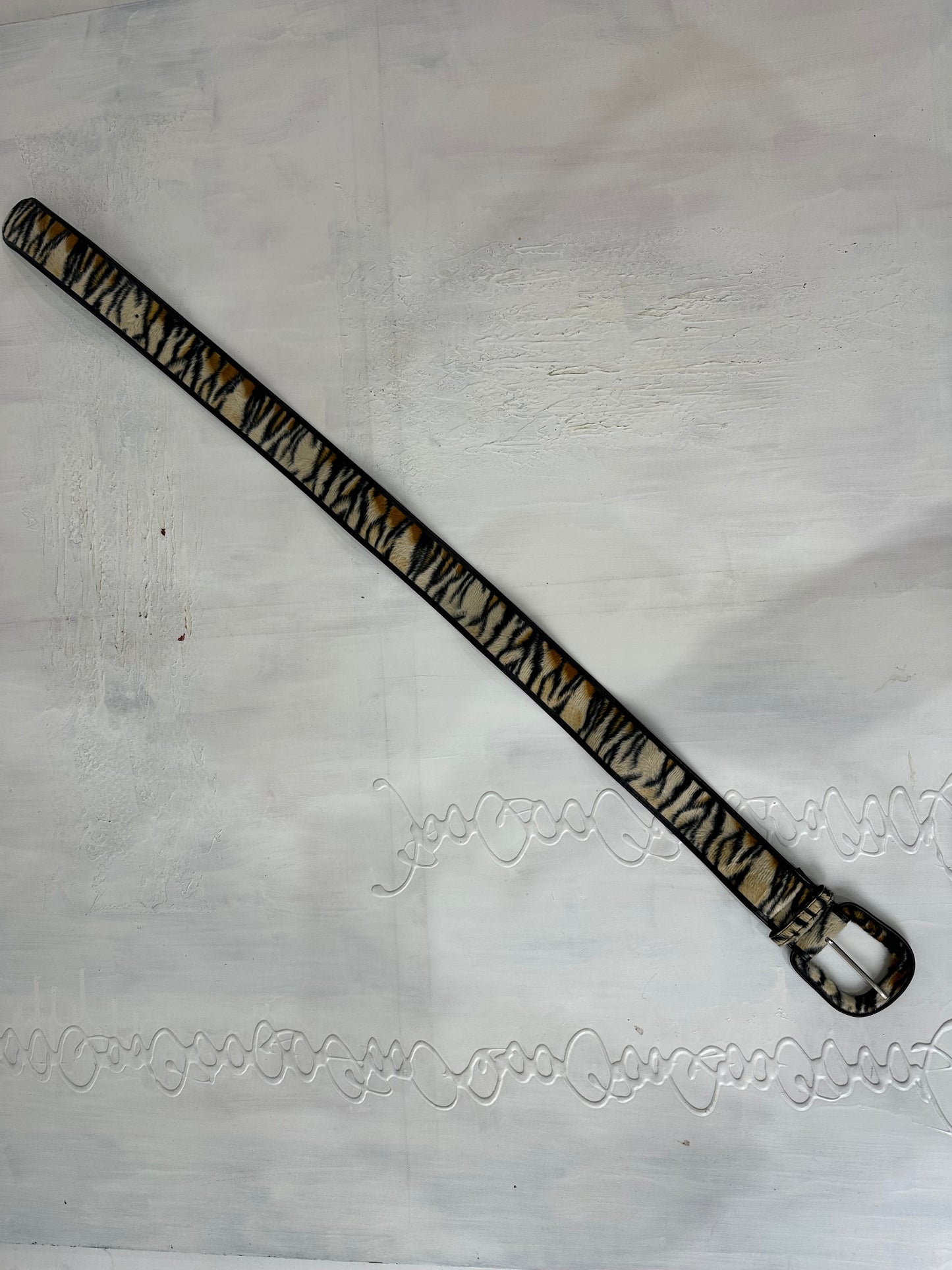 BEST PICKS | black and brown faux fur belt with tiger print