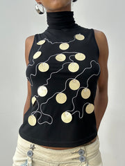 midsummer edit | small black sleeveless turtleneck with oversized sequin detail