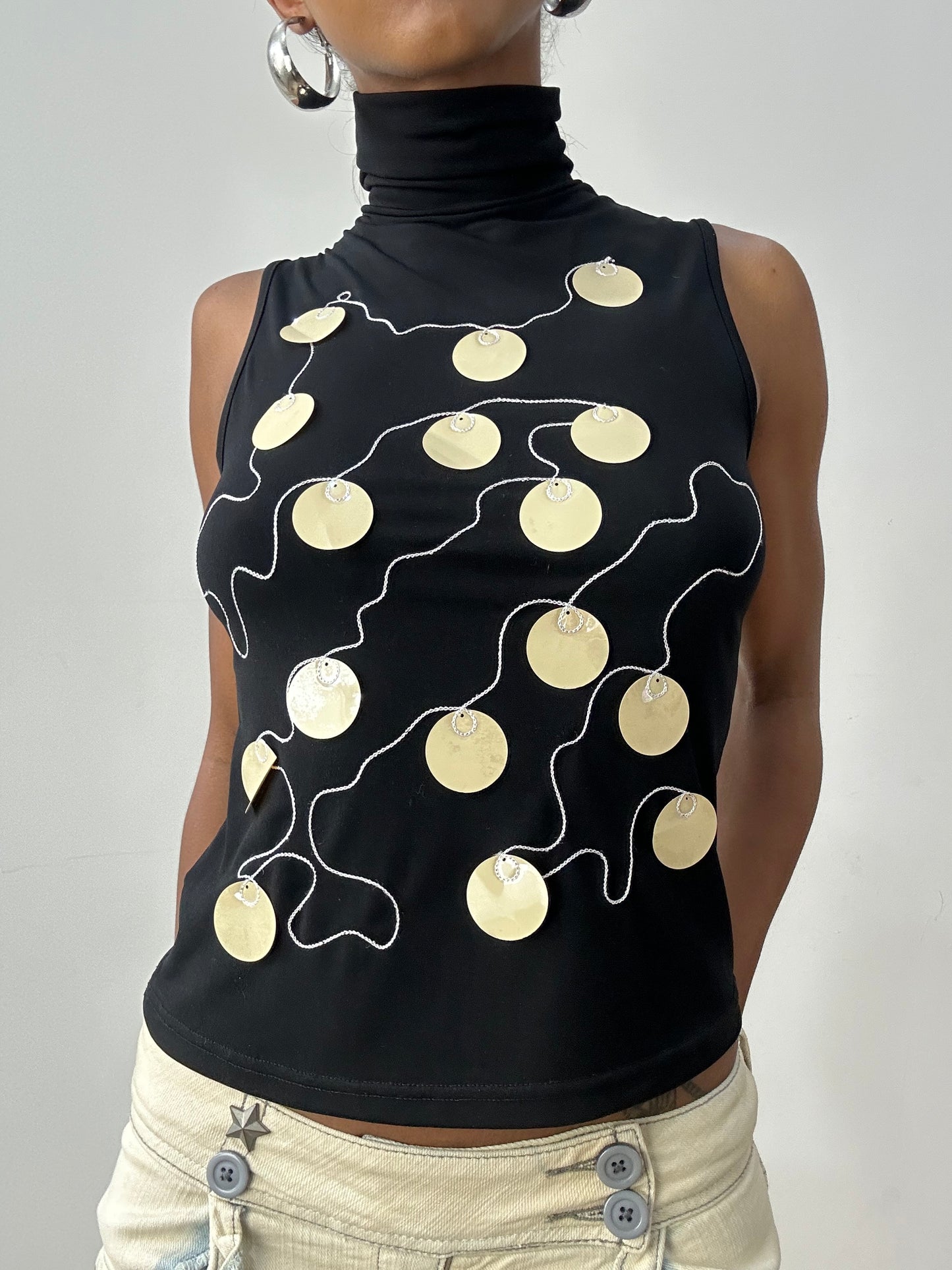 midsummer edit | small black sleeveless turtleneck with oversized sequin detail