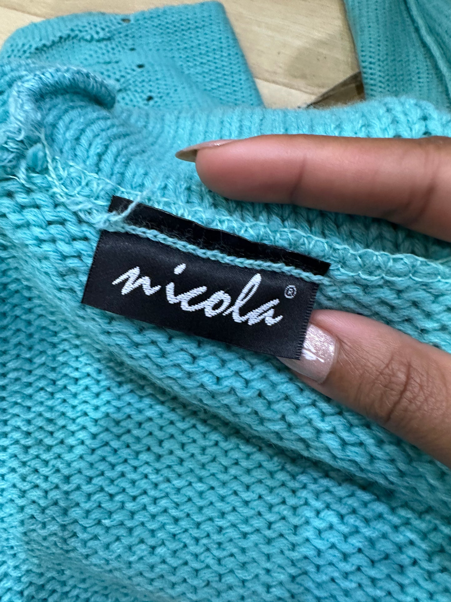 BEST PICKS | medium teal blue knit turtleneck jumper with ribbon details