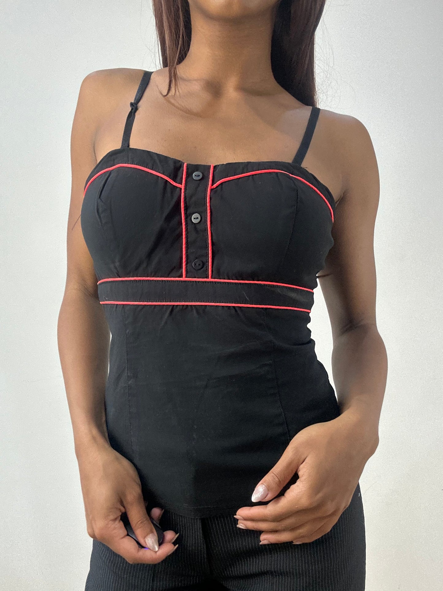 BEST PICKS | small black corset style top with red piping details